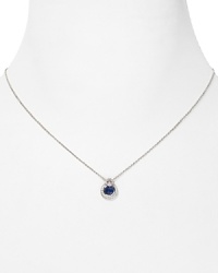 Elegant in its simplicity: delicate cubic zirconia stones surround a specially cut sapphire stone on this sterling silver Crislu pendant necklace - so perfect as a glittering final touch.