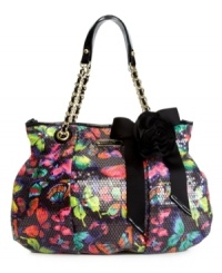 Vibrant colors and sparkling sequins add appeal to this fabulous tote from Betsey Johnson. Shiny goldtone hardware and a pretty ribbon accent perfectly complete this glam girl design.