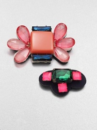 A colorful design with faceted stones set on a whimsically shaped back. Glass stonesPolyurethane coated nylon fabricSize, about 2.36 and 3.14Pin backMade in Italy 