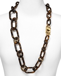 Timeless glamor is a hallmark of the Michael Kors brand. Make the look your new signature with this classically styled tortoise shell link necklace.