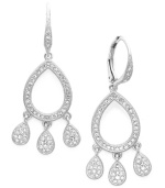 A vintage take on a classy pair of chandelier earrings. Eliot Danori's elegant style shimmers with the additino of sparkling crystals. Set in silver tone mixed metal. Approximate drop: 1 inch.