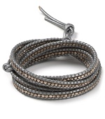 Wrap this handsome leather bracelet that's accented with sterling silver beads five times around your wrist for a dramatic finish to your casual cool look.