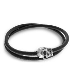 A grinning skull taps into your dark side with this wraparound bracelet from Tateossian.