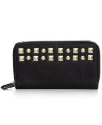 Take a tough girl approach to everyday organization with this studded wallet from Steve Madden. Ideally sized to slip inside a handbag, it boasts plenty of pockets and compartments for all the essentials.