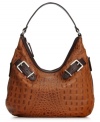 Explore the exotic with this croc-embossed leather hobo from Tignanello. Structured and sophisticated, it flaunts subtle belted detailing and plenty of pockets, for an effortless desk-to-dinner look.