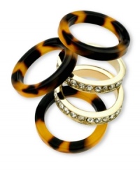 Mix and match with stackable style. This set of 5 rings from GUESS feature golden designs embellished with crystal accents and trendy tortoise hues. Crafted from gold tone mixed metal and tortoise resin. Size 7.