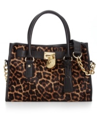 MICHAEL Michael Kors gives the ladylike satchel an edgy update with leopard print haircalf, stud accents and signature hardware. But don't let this silhouette's luxe look fool you: it's roomy, pocket-trimmed interior perfects practical style.