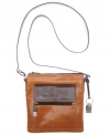 Crafted from two-tone glazed leather, this chic bag brings together heritage chic and the trendy crossbody shape for a look you can take anywhere.