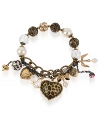 The wild life is calling. Betsey Johnson's multi-charm half stretch bracelet is crafted from antique gold- and hematite-tone mixed metal with glass pearls and fireball beads. The leopard-print heart gives it a bit of an edge. Item comes packaged in a signature Betsey Johnson Gift Box. Approximate length: 7-1/2 inches.