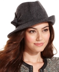 Reminiscent of the silver screen divas of the '40s, this fedora design from Nine West speaks classic chic. With an asymmetrical style and subtle bow accent, it's the perfect addition to any ensemble.