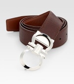 Smooth on one side and pebbled on the other, this reversible belt crafted in smooth Italian leather with double gancini buckle, will be a stylish, versatile addition to your existing wardrobe.LeatherAbout 2 wideMade in Italy