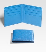 GG coated fabric with leather interior and trim. Two bill compartments Six credit card slots 4¼W X 3¾H Made in Italy