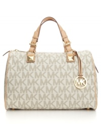 MICHAEL Michael Kors styles the classic purse in super-soft leather and adds bold hardware for a chic, modern finish.