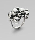 Make a simple statement with this sterling silver piece featuring an organic cluster of spheres. Sterling silverAdjustable fit Width, about 1Imported