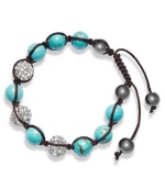 Spiritual-inspired bracelets are all the rage this season! Snap up this hot style from Ali Khan featuring semi-precious turquoise beads and pave glass fireballs on a trendy black cord. Bracelet adjusts to fit the wrist. Approximate diameter: 2 inches. Approximate length: 12-1/4 inches.