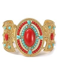 Nod to nautical-inspired style with this ornate coral and turquoise cuff bracelet from Carolee. Resist the urge to stack, this color-pop piece is a true soloist.