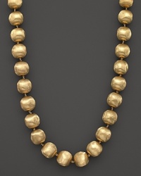 Hand engraved beaded necklace in 18K yellow gold from Marco Bicego's Africa collection.