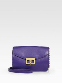 EXCLUSIVELY AT SAKS in Royal Purple. Smooth leather crafted in a petite flap silhouette, finished with a versatile leather and chain shoulder strap.Detachable shoulder strap, 22 dropTurnlock flap closureSix inside card slotsFully lined7½W X 4H X 1½DImported