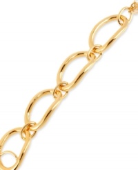 Well-connected. This bracelet from Robert Lee Morris is crafted from gold-tone mixed metal, and features oval links and a toggle closure. Approximate length: 7-1/2 inches.