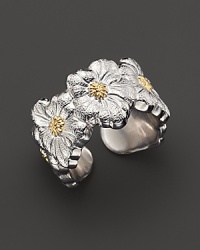 Delicate gardenias, captured at the height of their beauty in sterling silver and 18K yellow gold, bloom on this ring from Buccellati.