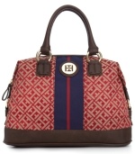 Elevate your style status with this posh, preppy purse from Tommy Hilfiger. Signature jacquard is bedecked with gleaming golden hardware and contrast striping, while the well-organized interior keeps all your essentials perfectly in place.