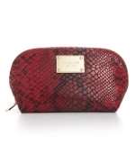 Revel in reptilian chic with this python-embossed cosmetic case from MICHAEL Michael Kors. Accented with signature detailing, it's sized-right to stow a bevy of beauty essentials.