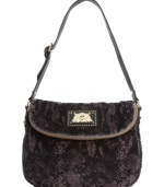 Call of the wild. Tap into the reptilian trend with this snakeskin print purse from Juicy Couture. Soft velour is outfitted with luxe golden hardware and signature detailing, making it the ultimate diva-licious design.