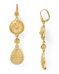 Nod to nautical style with this pair of gleaming drop earrings from T Tahari. Topaz crystals dress up engraved 14-karat gold plated teardrops.