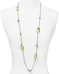 A bit vintage glamor, a bit statement piece, this gold-plated Alexis Bittar necklace styles your look Art Deco with crystal-detailed stations.