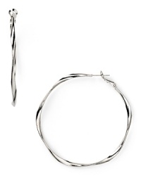 Delicately twisted, this pair of metal hoop earrings from Aqua is a sophisticated take on a classic style. Make them part of your 24/7 collection to add a simple, silvery touch to every look.