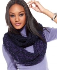 Stay one step ahead of cold weather with this chunky knit infinity scarf from Nine West. Dressed in a traditional tweed pattern in a rich jewel tone color, it's the coziest accessory to keep you warm all winter.