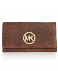 Get organized in the most exotic way with this ostrich-embossed leather lovely from MICHAEL Michael Kors. Sized-right to slip inside a handbag or be carried on its own, it boasts plenty of pockets to keep your currency safe and secure.