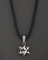 A sterling silver star on a rugged leather chain. From the John Hardy Dayak collection.