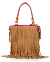 Care-free and unconventional, this fun fringe satchel by Steve Madden pays homage to the '70s Haight-Ashbury hippie-chic. Braided handle detail and matching crossbody strap offer convenience and cool, while interior cell phone and PDA pockets keep modern devices secure.