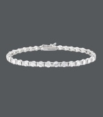 For a look that's red-carpet worthy...strike a pose in B. Brilliant! This eye-catching tennis bracelet features dozens of sparkling, channel-set cubic zirconias (10 ct. t.w.). Crafted in sterling silver. Approximate length: 7-1/4 inches.