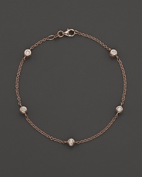 Diamond stations on a fine rose gold chain bracelet.