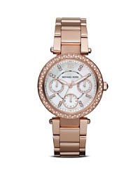 Tap this season's rose-gold jewelry trend with this chicly sized watch from MICHAEL Michael Kors, boasting a classic round shape and crystal adornments. If small, this timepiece ensures supreme round-the-clock style.