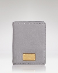 Key in and covet this MARC BY MARC JACOBS card case, coolly crafted of leather with understated details.