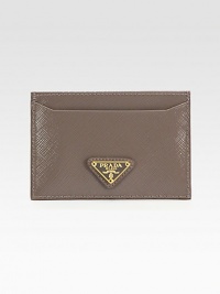 Saffiano vernice leather in a flat compact design.Two open pocketsFully lined4W X 2¾H X ¼DMade in Italy