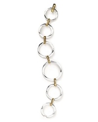 No need to choose between silver and gold with this Lauren Ralph Lauren bracelet--you can rock them both. This graduated two-tone bracelet looks great alone or when paired with stacks of other small bangles. Mix up the look depending on your outfit!