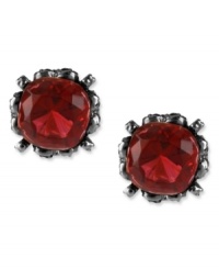 Red haute. This set of stud earrings from Betsey Johnson is crafted from hematite-tone mixed metal and features a red gem in the center for a stylish statement. Approximate drop: 1/2 inch.