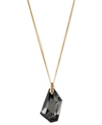 Black is beautiful. Kenneth Cole New York's necklace, crafted from gold-tone mixed metal, dazzles with a faceted black pendant. Item comes packaged in a signature Kenneth Cole New York Gift Box. Approximate length: 16 inches + 3-inch extender. Approximate drop: 2-1/4 inches.