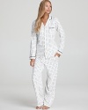 All-over polka dots lend a retro feel to this lace- and ribbon-accented pajama set from Eileen West.