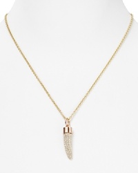 A bold crystal bedecked horn adorns a simply styled link chain on a powerful Rebecca Minkoff pendant necklace, crafted of plated brass.