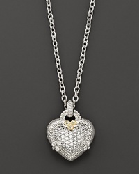 Pavé white sapphires glitter on this intricate heart pendant, strung on a gleaming sterling silver chain. A touch of 18Kgold detailing and a heart cutout at back add rich interest.