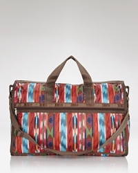 Updated in a bold print, LeSportsac's do-it-all duffel bag is crafted from nylon to be your trusty travel companion.