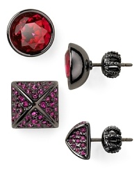 Wear them together, separately, or mixed and matched. We adore the chic geometry of Juicy Couture's round and pyramid studs.