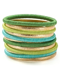 Cool girl style is all in the wrist--piled high with these boldly hued and subtly textured RJ Graziano bangles.