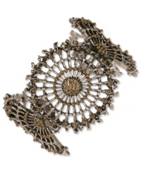 An openwork design captivates on Lucky Brand's chic cuff bracelet. Features intricate patterns crafted in gold tone and silver tone mixed metal. Approximate diameter: 2-3/8 inches.