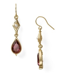 For eye-catching accessorizing, this pair of 14-karat gold teardrop earrings from Lauren Ralph Lauren ticks the right boxes, accented by amethyst stones.